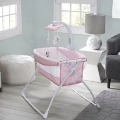 Delta Children Deluxe Activity Sleeper Bassinet