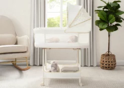 Delta Children Precious Moments Auto Glide Bassinet