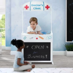 Delta Children What's New Reversible 4-in-1 Pretend Play Center With Chalkboard & Storage