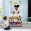 Delta Children What's New Reversible 4-in-1 Pretend Play Center With Chalkboard & Storage