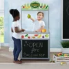 Delta Children Reversible 4-in-1 Pretend Play Center With Chalkboard & Storage What's New