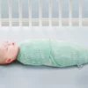Delta Children Little Lambs Adjustable Swaddle Wrap - Size Small/Medium, Fits Babies 0-3 Months/7-14 Lbs. Swaddles